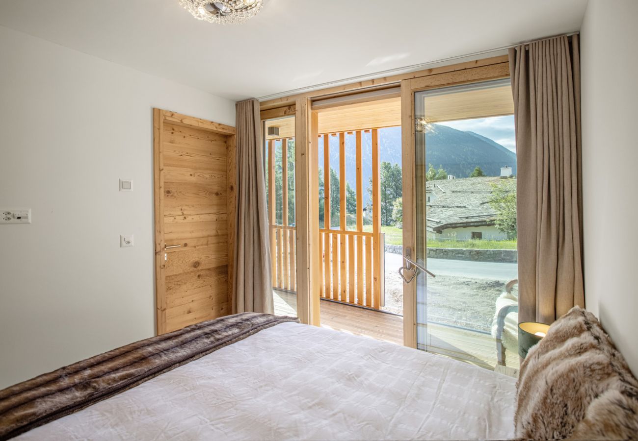 Apartment in Samedan - Chesa Muntanella 3 - Sustainable new building with panoramic view of the mountains for architecture lovers